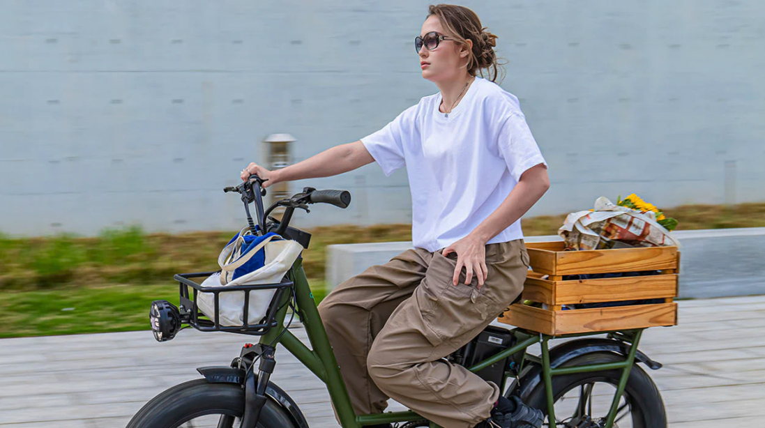 A woman riding a bike