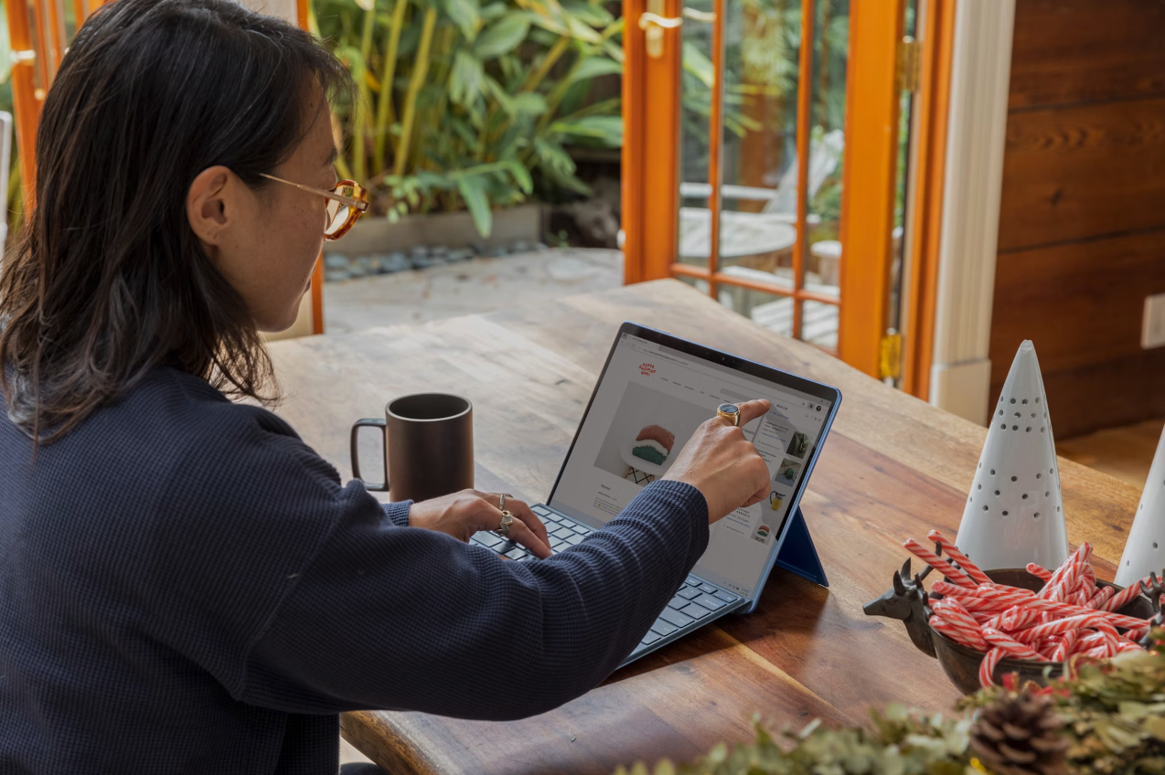 A woman working on a tablet