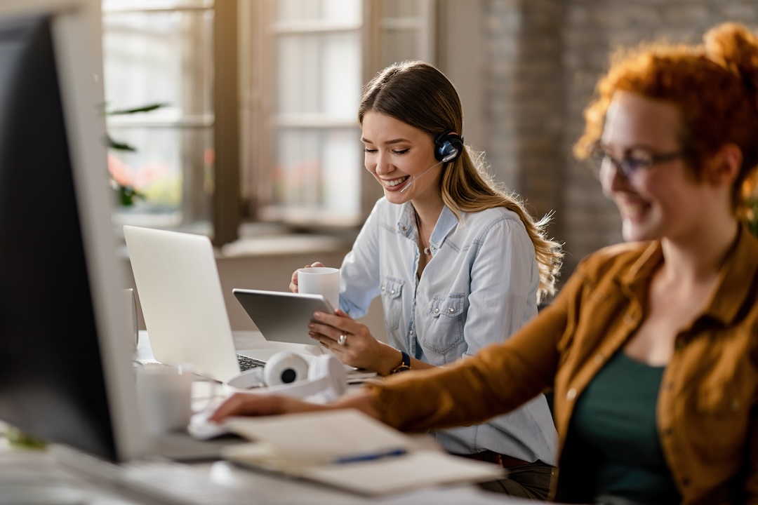 Smiling Female Helpdesk Personnel