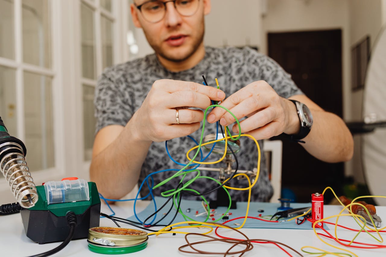 A man working on wires