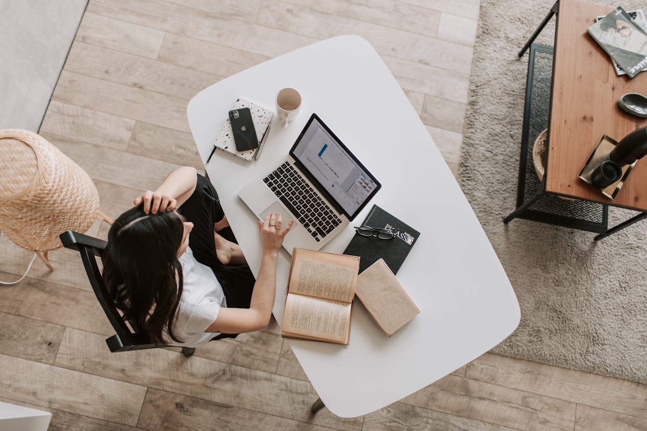 A woman working on laptop