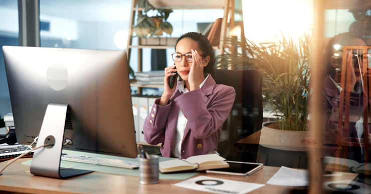 A woman on the phone in office