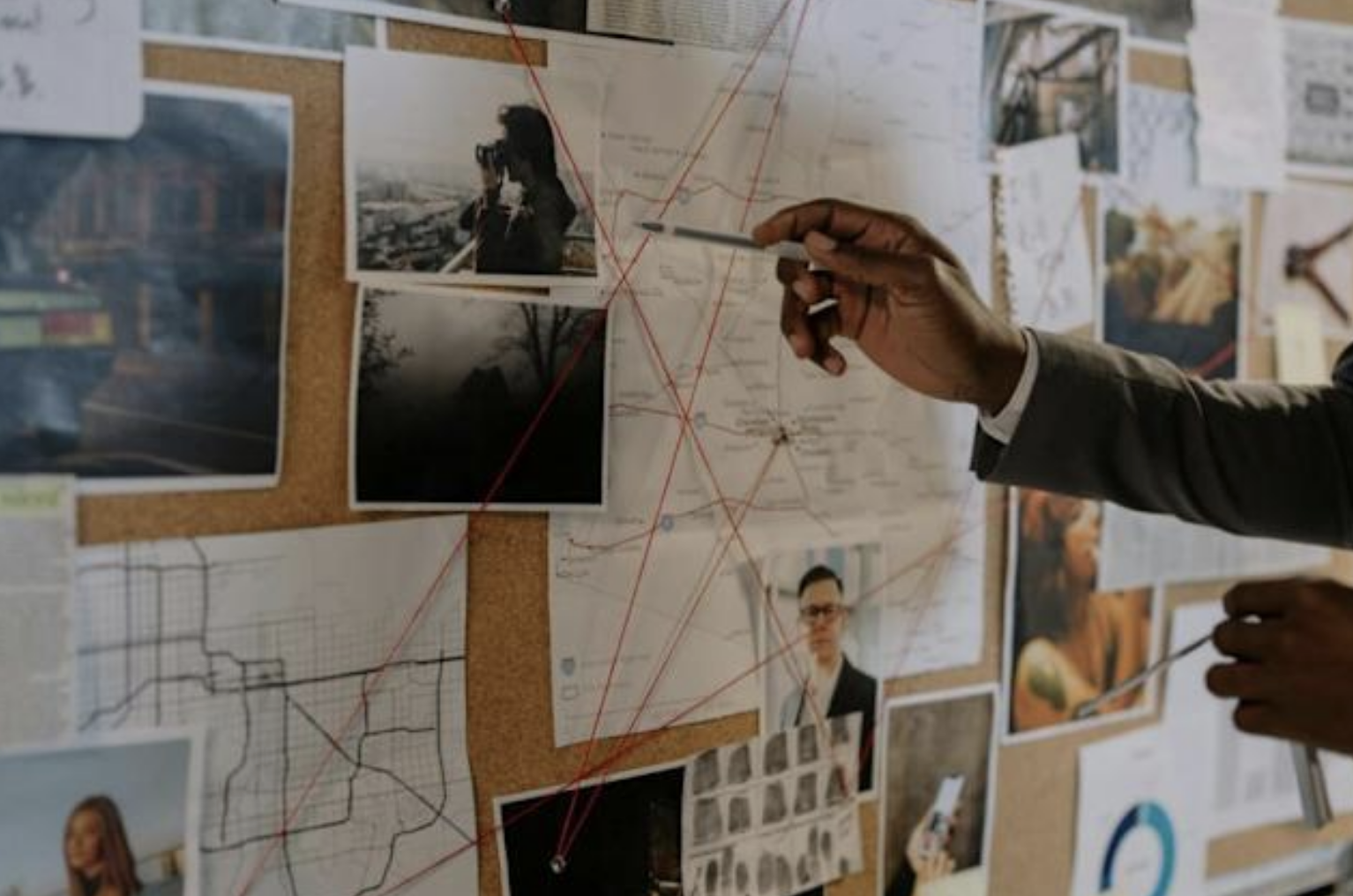 Investigators analyzing evidence board