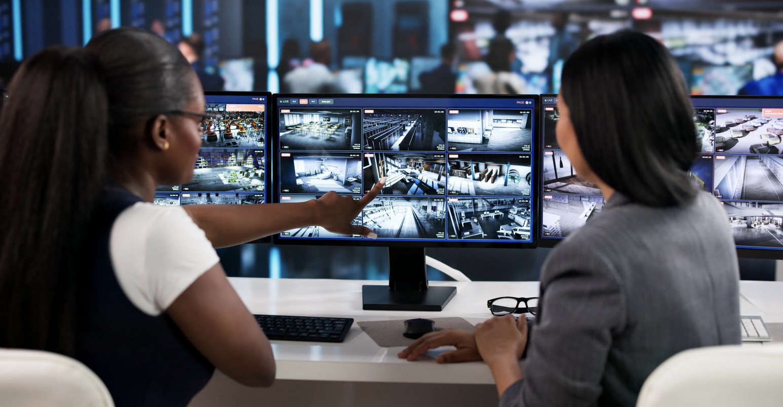 Security team reviewing surveillance footage