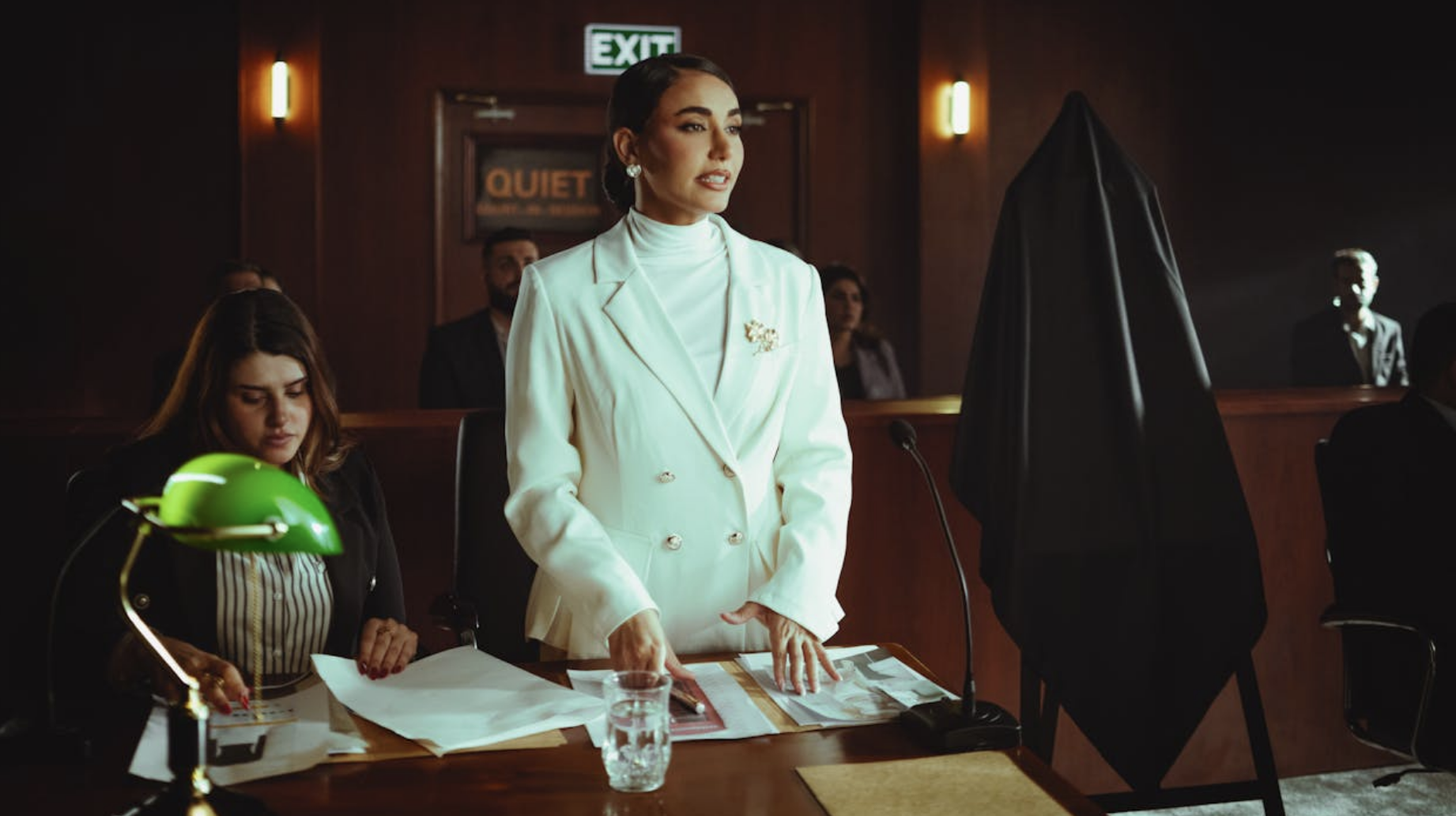 Confident Female Lawyer Presenting Case in Courtroom