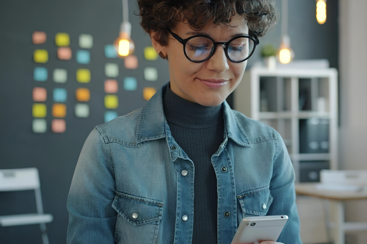 Teen using smartphone