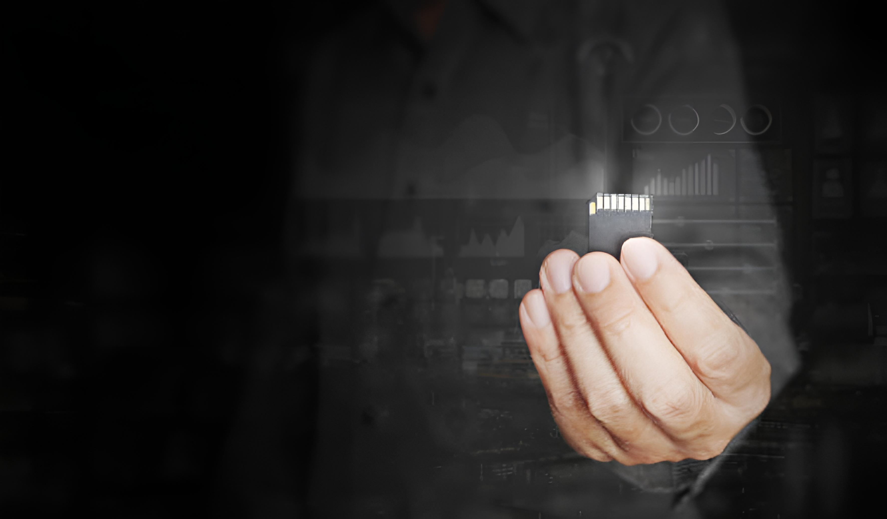 Hand holding memory card