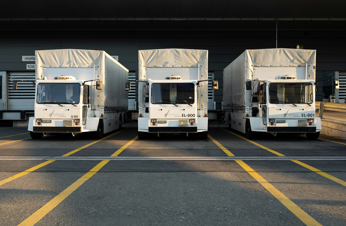 Freight trucks at warehouse loading dock