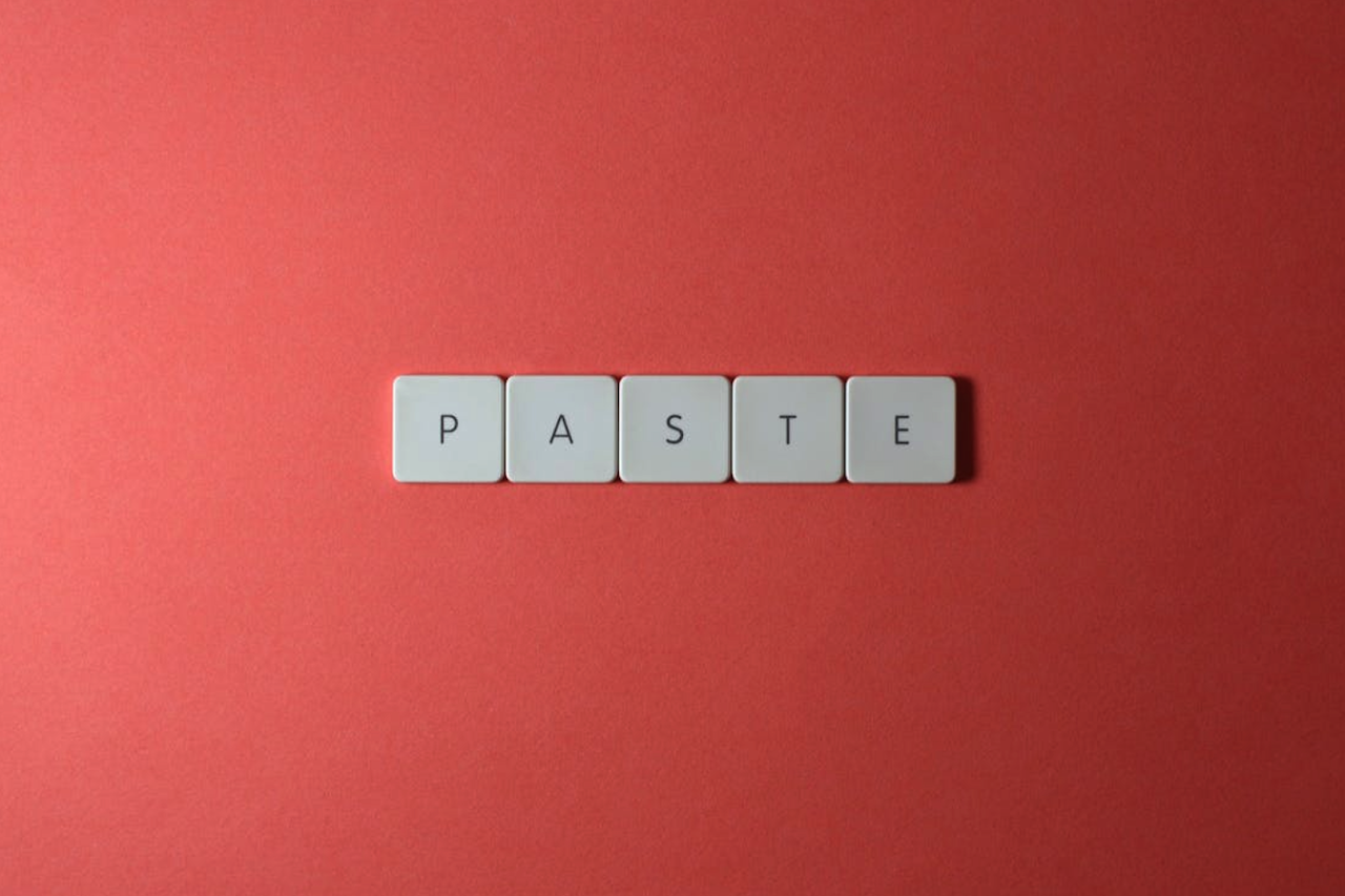 Paste keyboard keys on red background